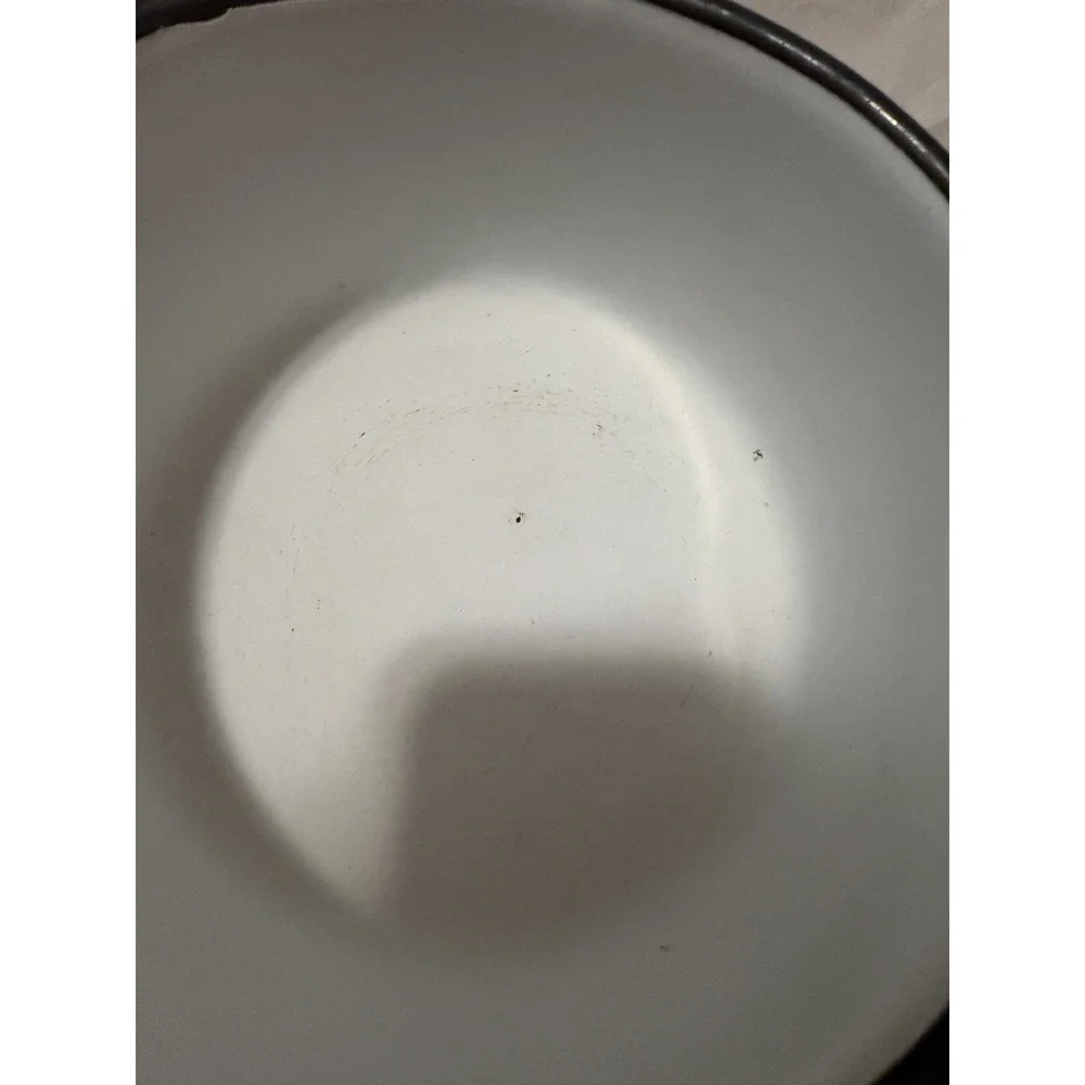 vintage light blue enamelware saucepan